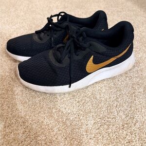 Nike Black and Gold Athletic Shoes